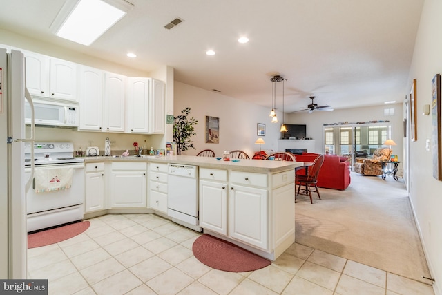 kitchen featuring white cabinetry, white appliances, pendant lighting, and kitchen peninsula