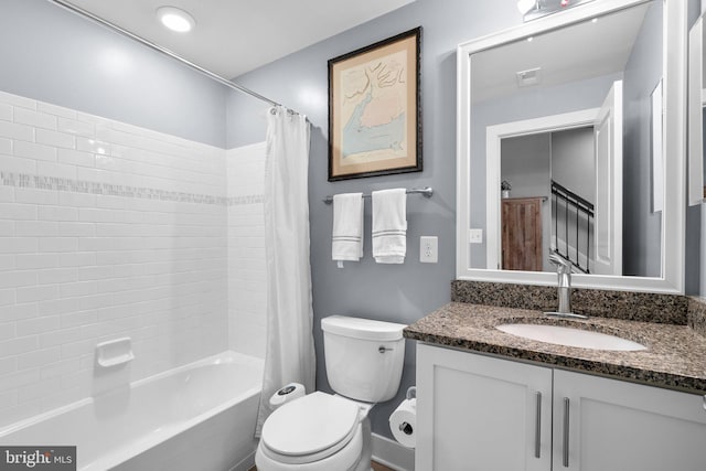 full bath with visible vents, toilet, vanity, and shower / bath combination with curtain