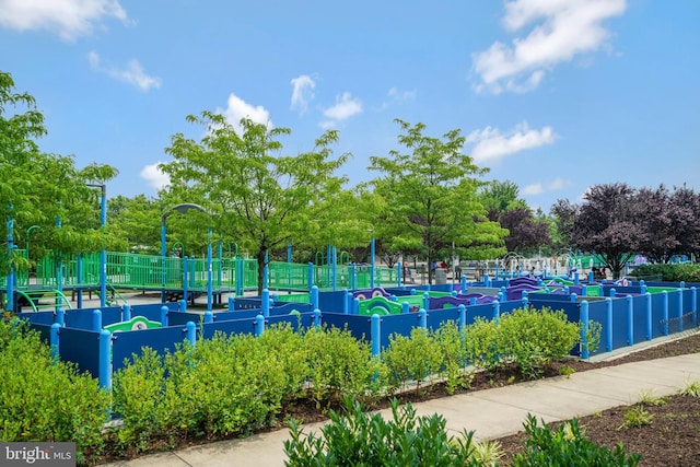 view of tennis court with fence