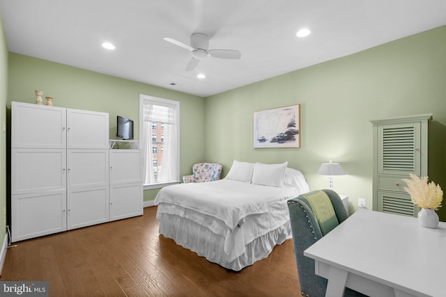 bedroom with recessed lighting, dark wood-style floors, and ceiling fan