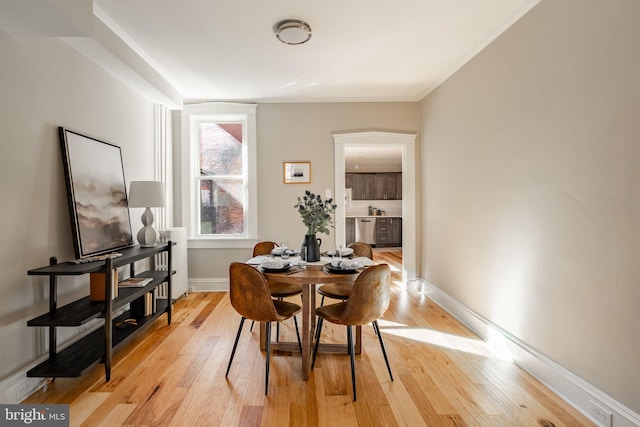 dining room with light wood-type flooring