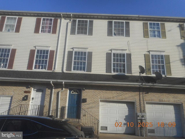 view of property featuring a garage