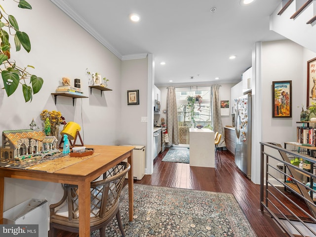 interior space featuring crown molding and dark wood-type flooring