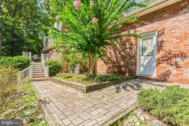 property entrance with a patio