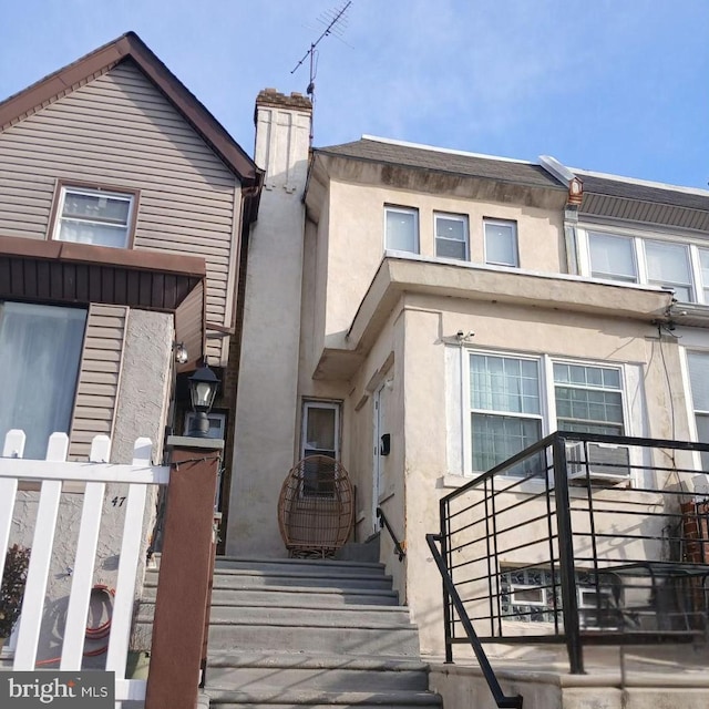 multi unit property featuring stucco siding