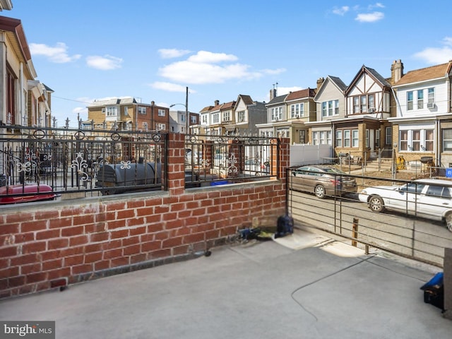 view of patio / terrace featuring a residential view