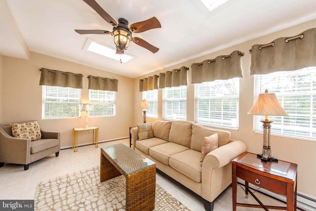 living area featuring light tile patterned floors, a baseboard radiator, baseboard heating, ceiling fan, and vaulted ceiling with skylight