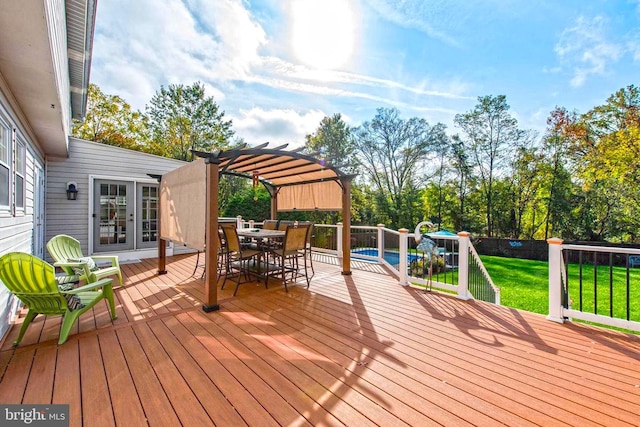 wooden terrace featuring a fenced in pool, a lawn, a pergola, and outdoor dining space