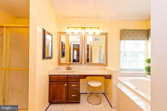 full bath with visible vents, a shower with shower door, a garden tub, tile patterned flooring, and vanity