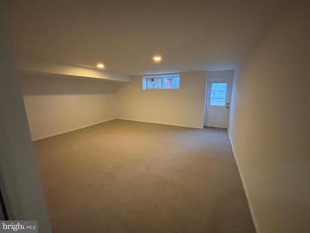 basement with carpet flooring