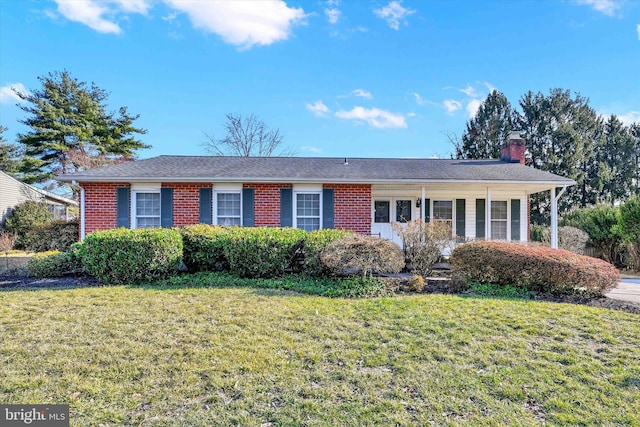 single story home with a front lawn