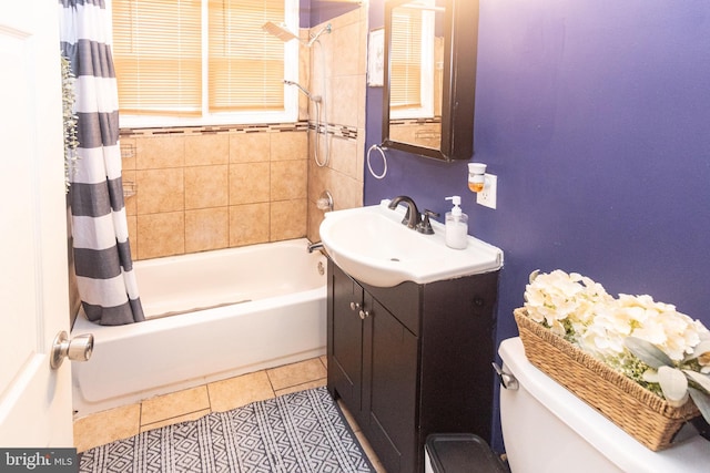 full bathroom with tile patterned floors, toilet, shower / bath combo, and vanity