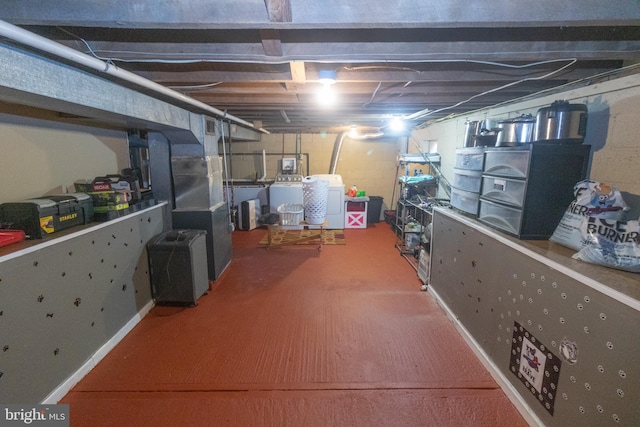 storage featuring washer and clothes dryer