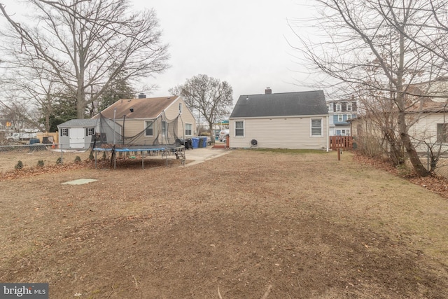 view of yard with a trampoline