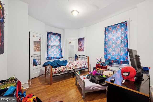 bedroom featuring hardwood / wood-style floors