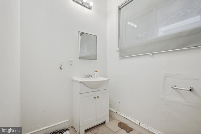 bathroom with vanity and tile patterned floors