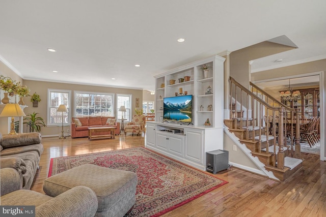 living area with recessed lighting, baseboards, ornamental molding, stairway, and light wood finished floors