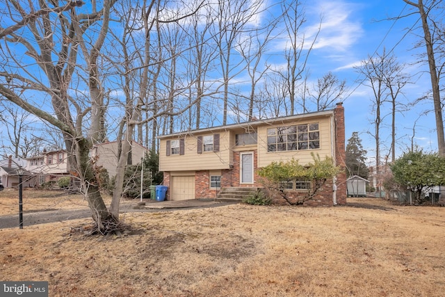 split foyer home featuring a garage