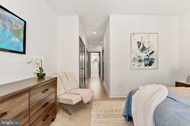 bedroom featuring light hardwood / wood-style flooring