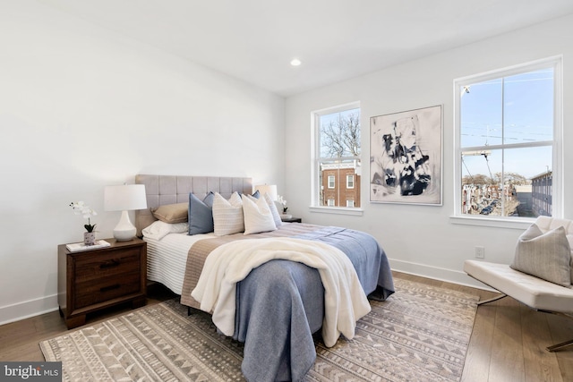 bedroom with hardwood / wood-style flooring