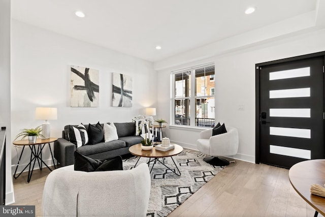 living room with light hardwood / wood-style floors