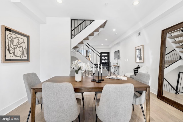 dining room featuring light wood-type flooring