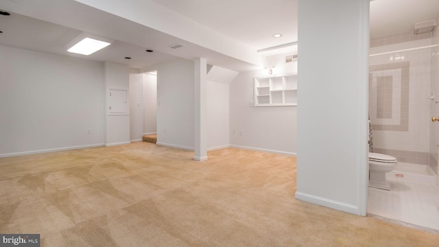 basement with light carpet