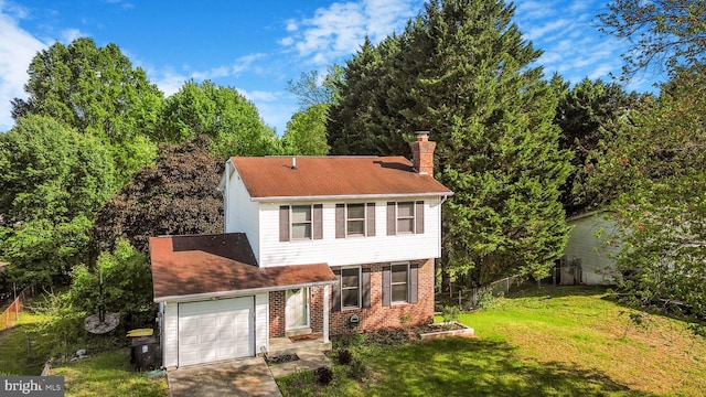 9928 Gay Dr, Upper Marlboro, MD 20772 - view of front of home featuring a chimney, brick siding, fence, a front lawn, and an attached garage