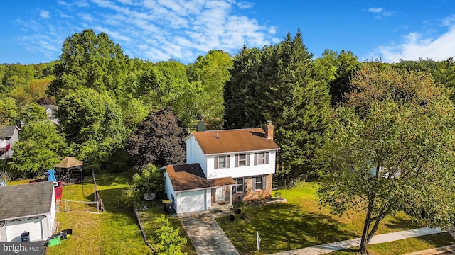 9928 Gay Dr, Upper Marlboro, MD 20772 - drone / aerial view with a wooded view