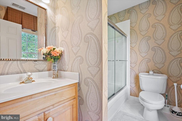 full bath featuring tile patterned flooring, toilet, vanity, and wallpapered walls