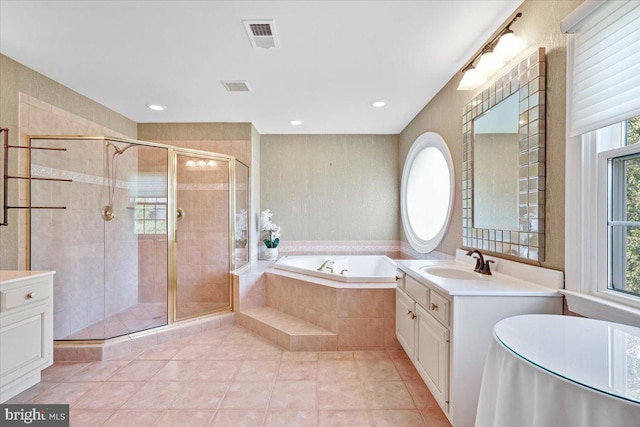 full bathroom with tile patterned floors, visible vents, a shower stall, a bath, and vanity