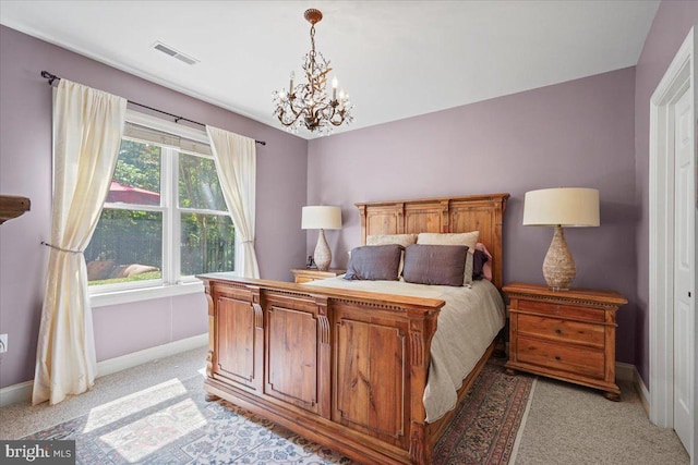 bedroom with a notable chandelier, baseboards, and visible vents