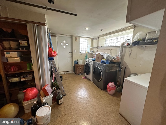 washroom featuring separate washer and dryer