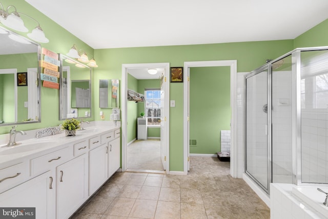 bathroom with vanity, tile patterned flooring, and shower with separate bathtub