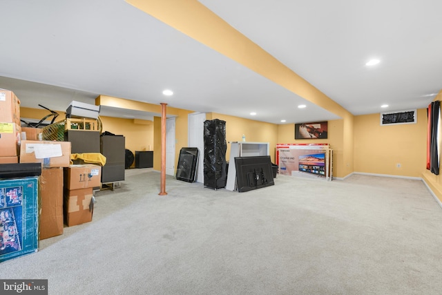 basement with light colored carpet