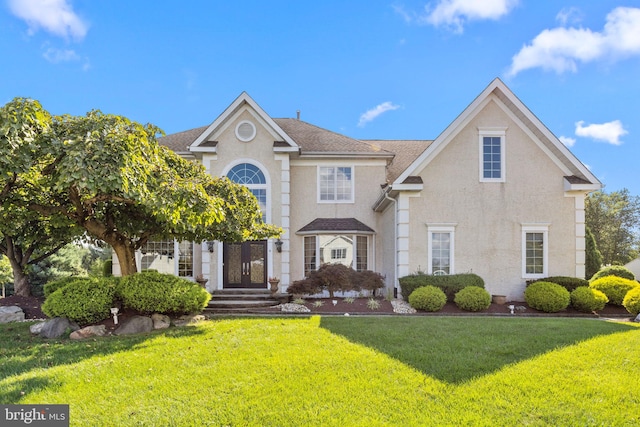 view of front facade with a front yard