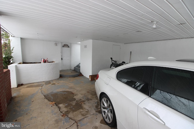 garage with a carport