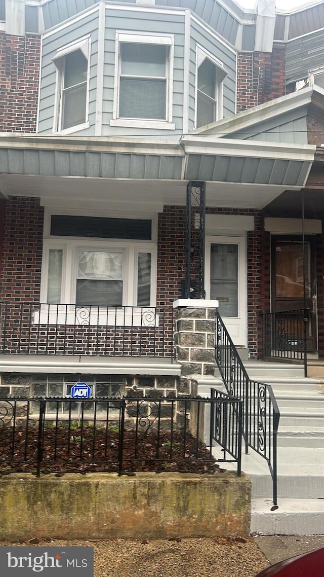 entrance to property with covered porch