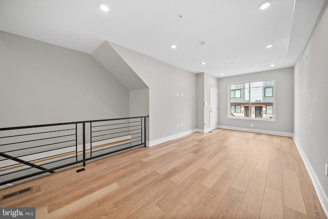 unfurnished living room featuring light hardwood / wood-style flooring