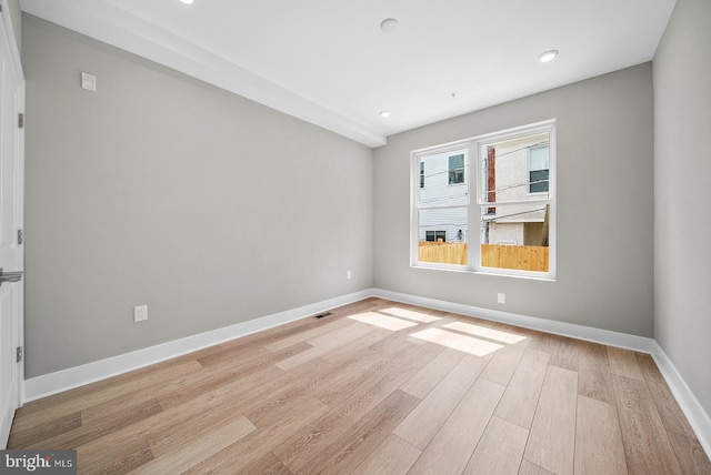 empty room featuring light wood-type flooring