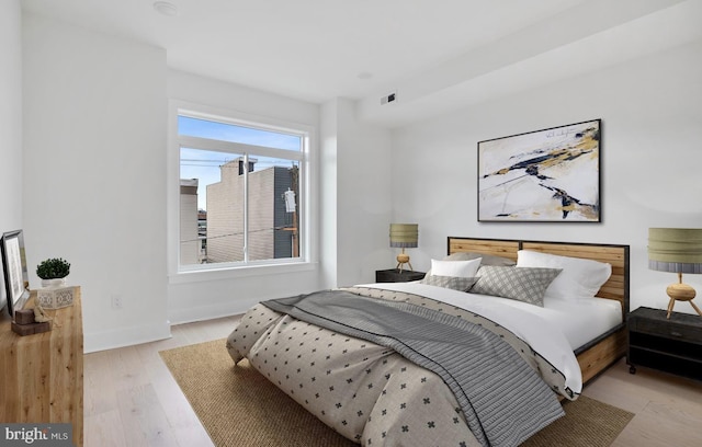 bedroom featuring light wood-type flooring