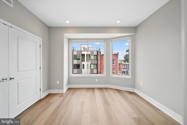 empty room featuring light hardwood / wood-style flooring