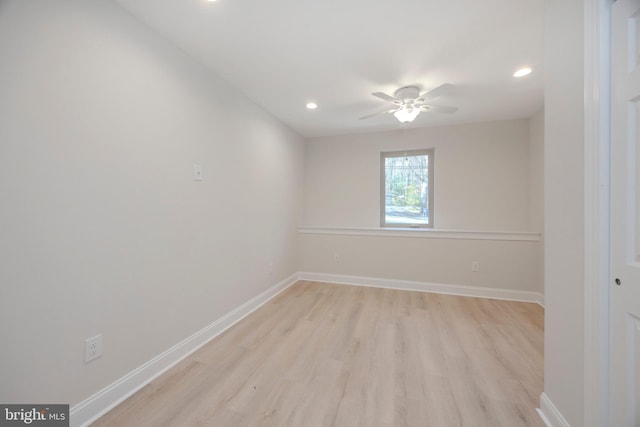 spare room with light wood-style flooring, baseboards, a ceiling fan, and recessed lighting