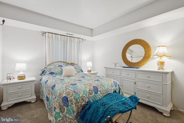 carpeted bedroom with visible vents