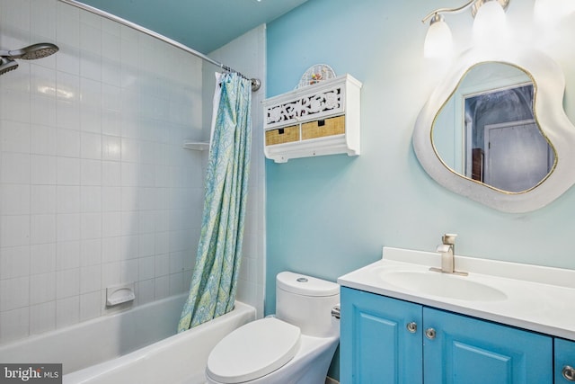 bathroom featuring shower / bathtub combination with curtain, vanity, and toilet