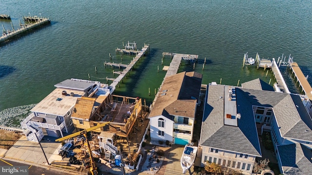 drone / aerial view with a water view