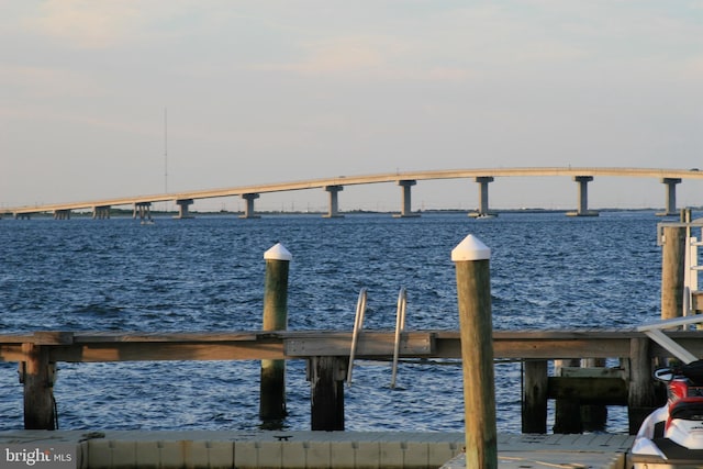 view of dock with a water view