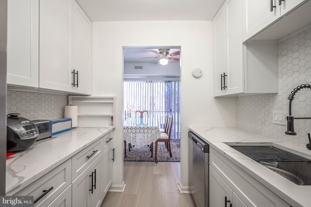 kitchen with white cabinetry and dishwasher