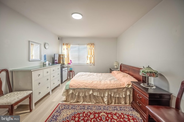 bedroom with light hardwood / wood-style flooring