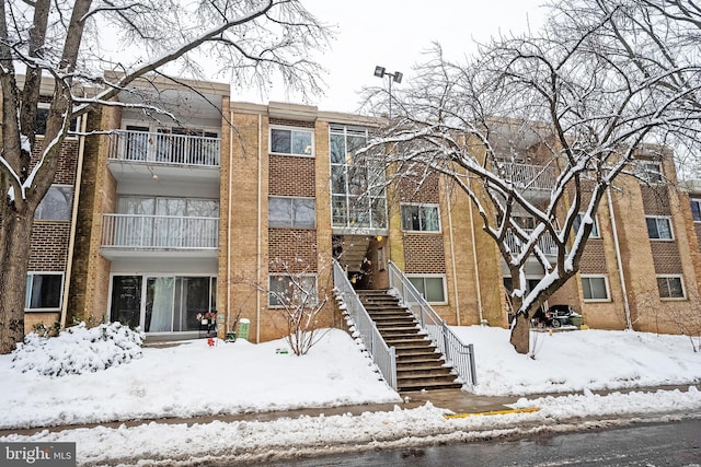 view of snow covered property